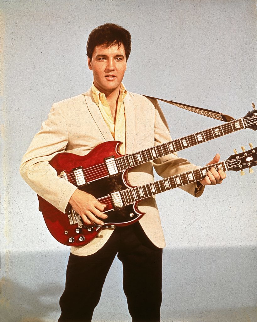 Elvis with a twelve string guitar, mid 1950s (Hulton Archive/Getty Images)