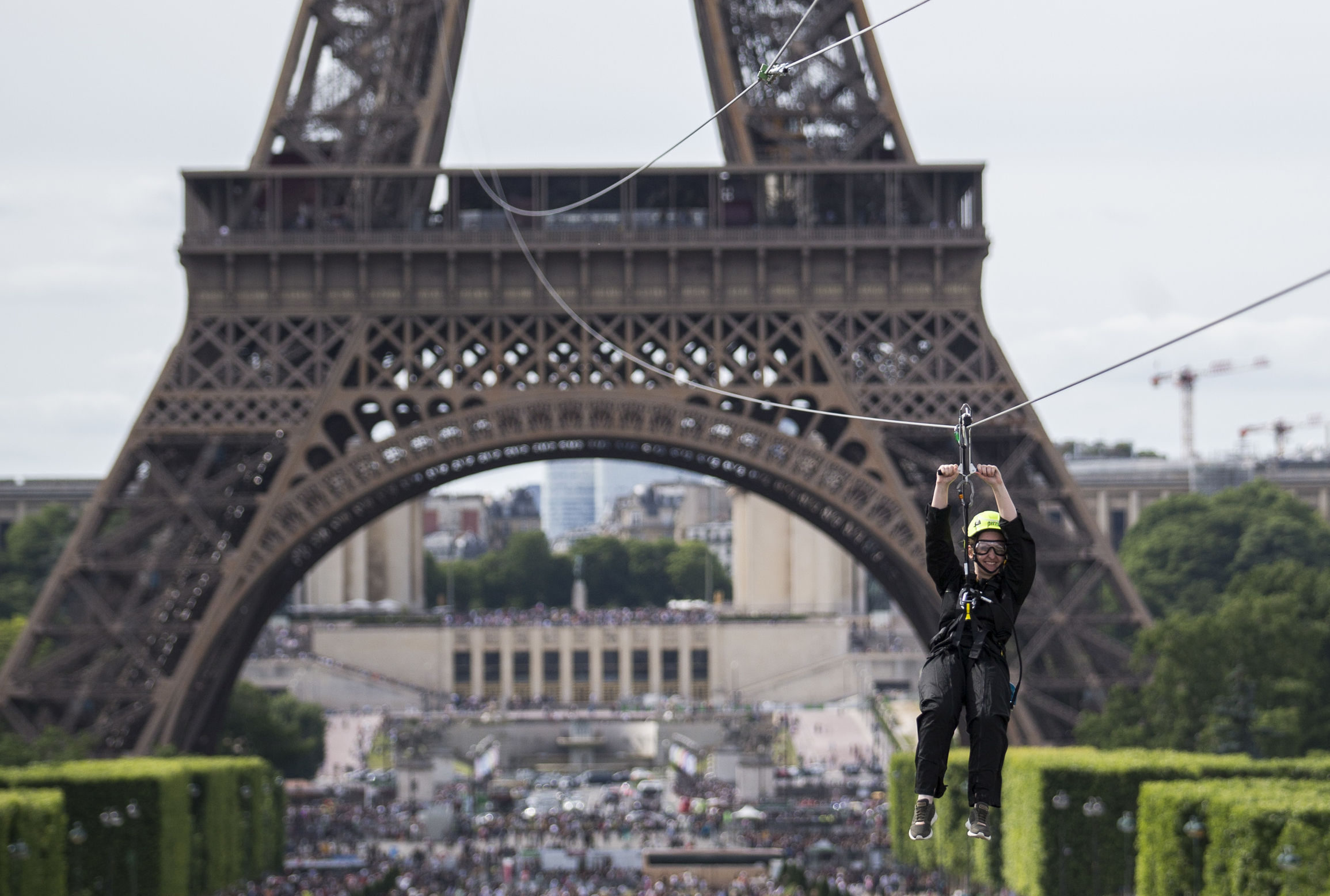 VIDEO: Thrillseekers speed down zip line from Eiffel Tower balcony ...