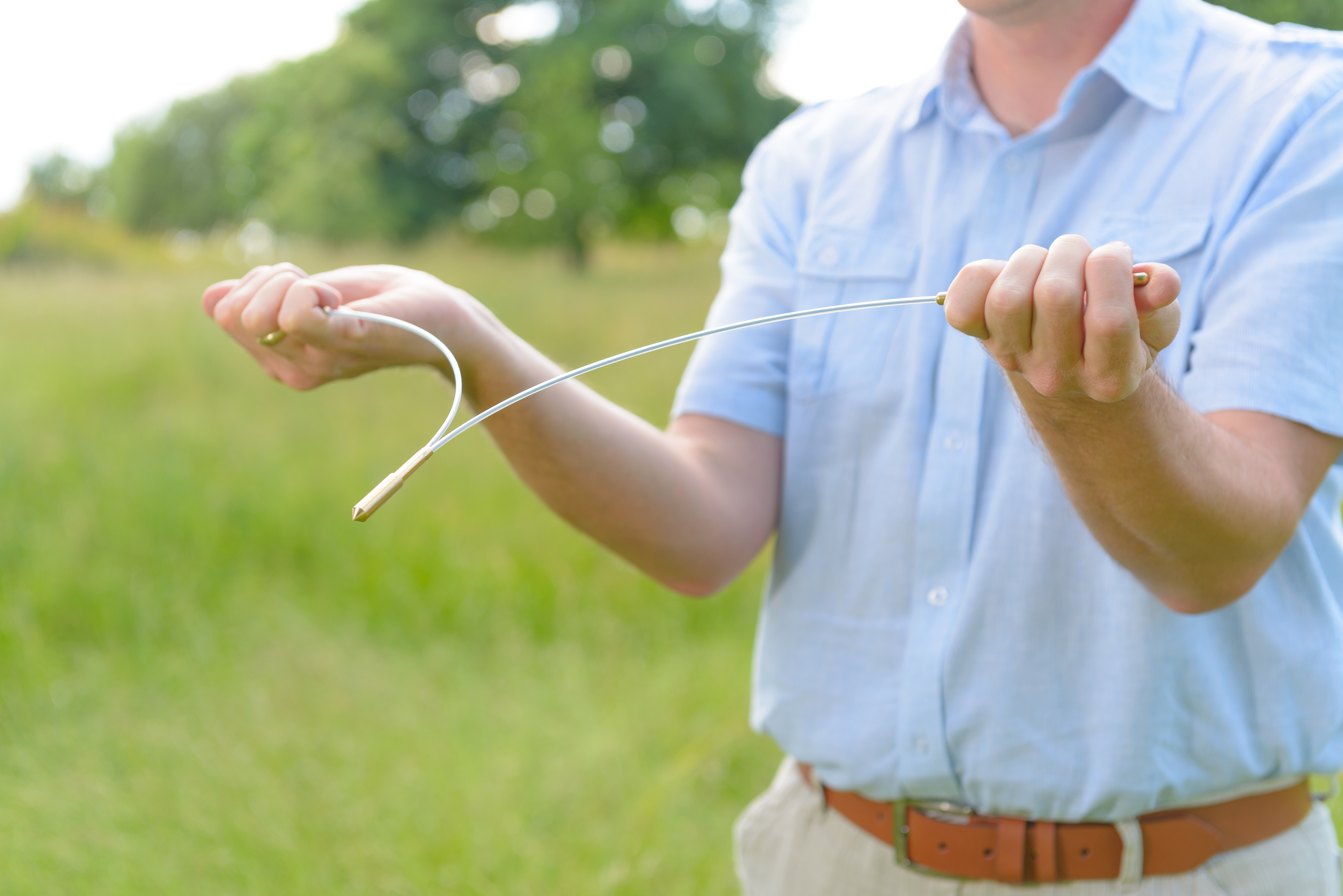 some-scottish-water-engineers-are-using-dowsing-rod-technique-likened